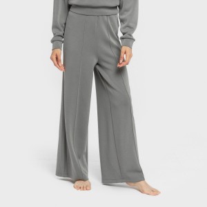 Pantalón largo pinzas fluido mujer